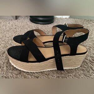 Black and tan espadrilles